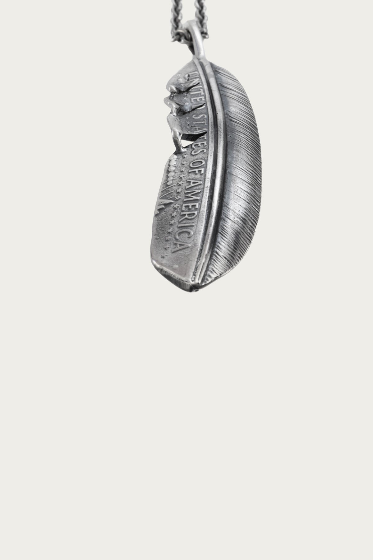 North Works - 50¢ Half Feather Pendant - Canoe Club