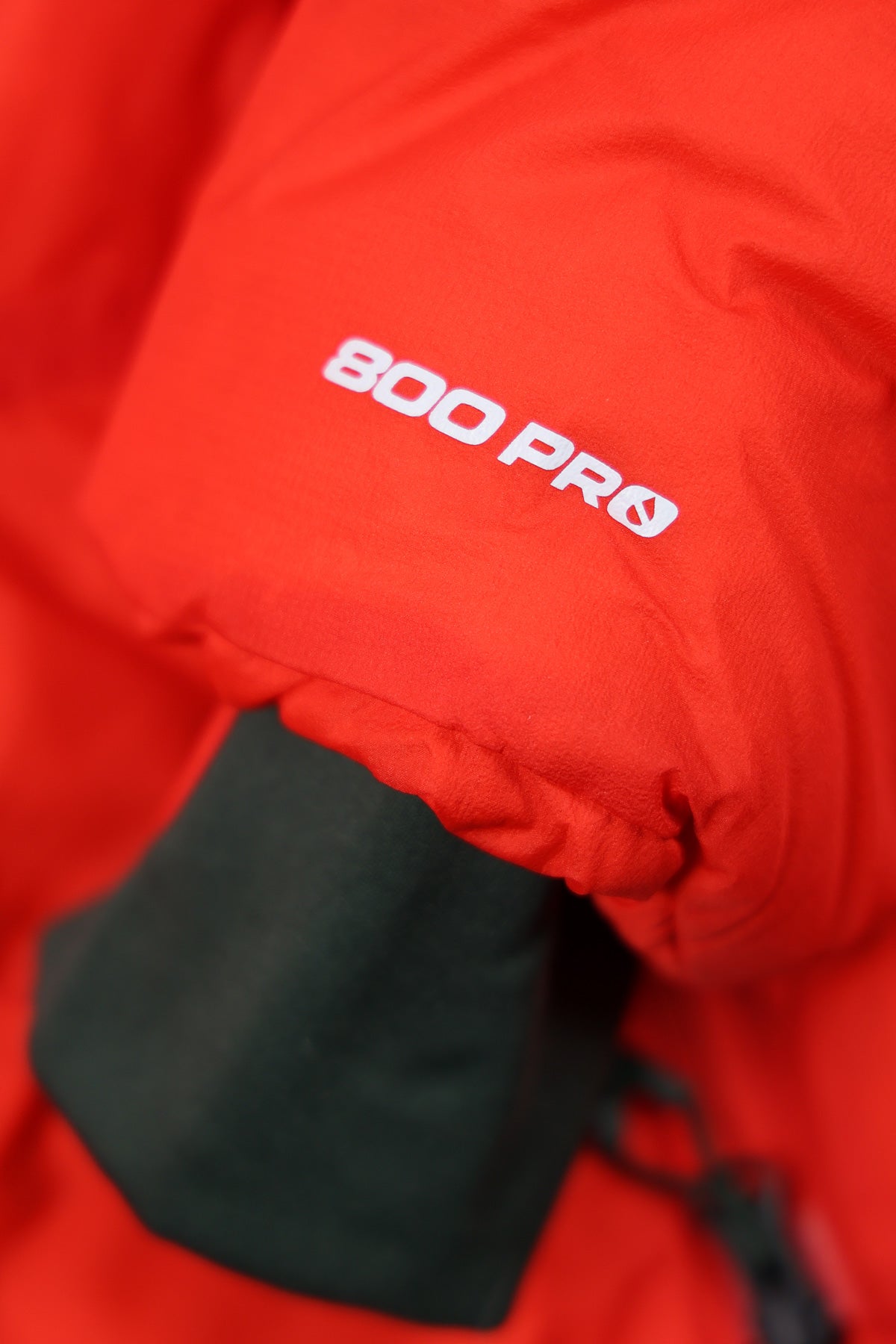 The North Face - TNF x Undercover Soukuu Nuptse - Dark Cedar Green/High Risk Red - Canoe Club