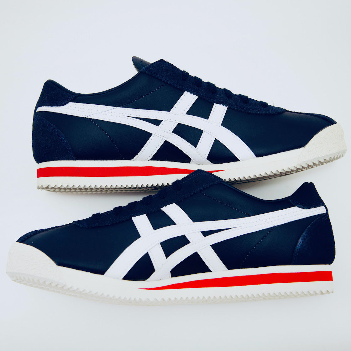onitsuka tiger vs asics logo