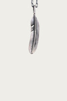 North Works - 25¢ Liberty Feather Pendant - Canoe Club