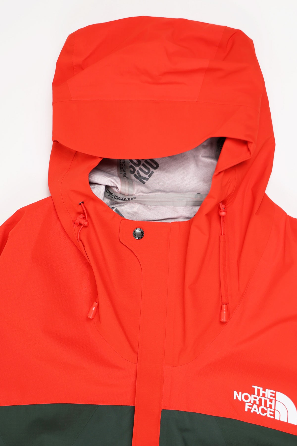 The North Face - TNF x Undercover Soukuu Geodesic Shell Jacket - Dark Cedar Green/High Risk Red - Canoe Club