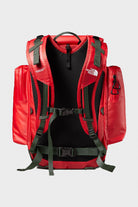 The North Face - TNF x Undercover Soukuu Backpack - Dark Cedar Green/High Risk Red - Canoe Club