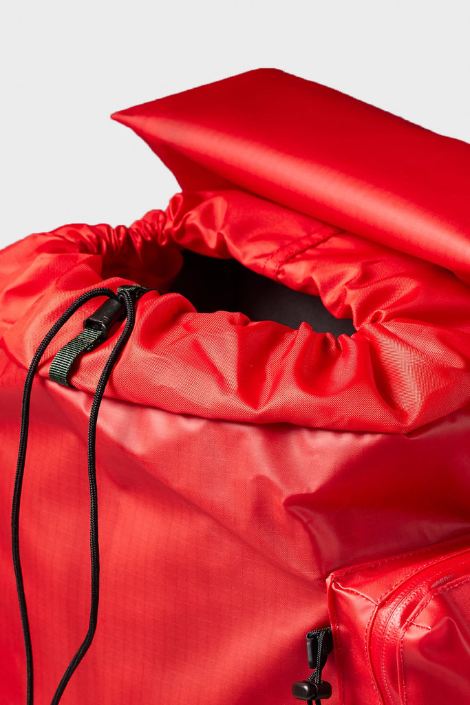 The North Face - TNF x Undercover Soukuu Backpack - Dark Cedar Green/High Risk Red - Canoe Club