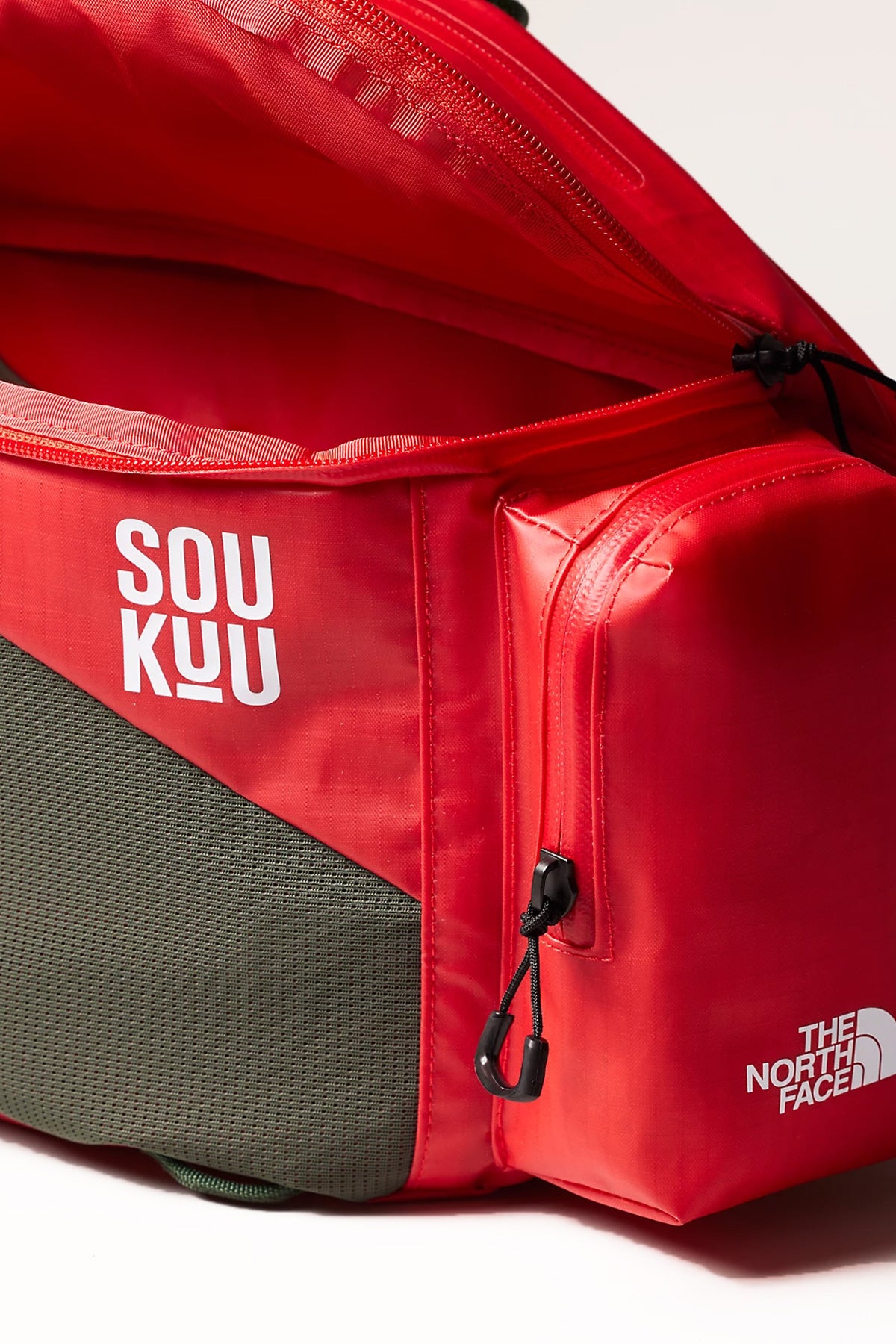 The North Face - TNF x Undercover Soukuu Waistpack - Dark Cedar Green/High Risk Red - Canoe Club