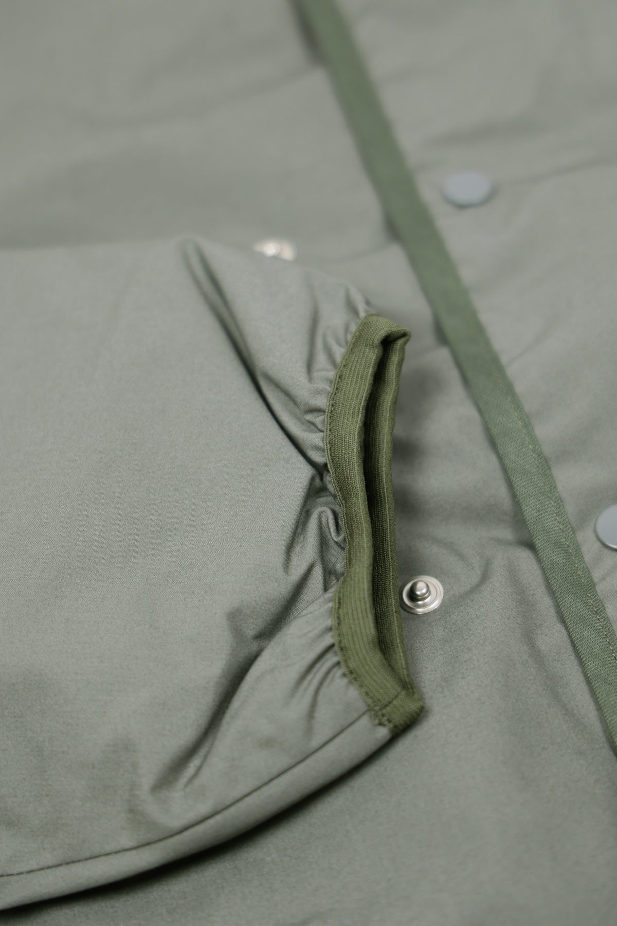 Nanamica Reversible Down Cardigan | Sage Green | Canoe Club